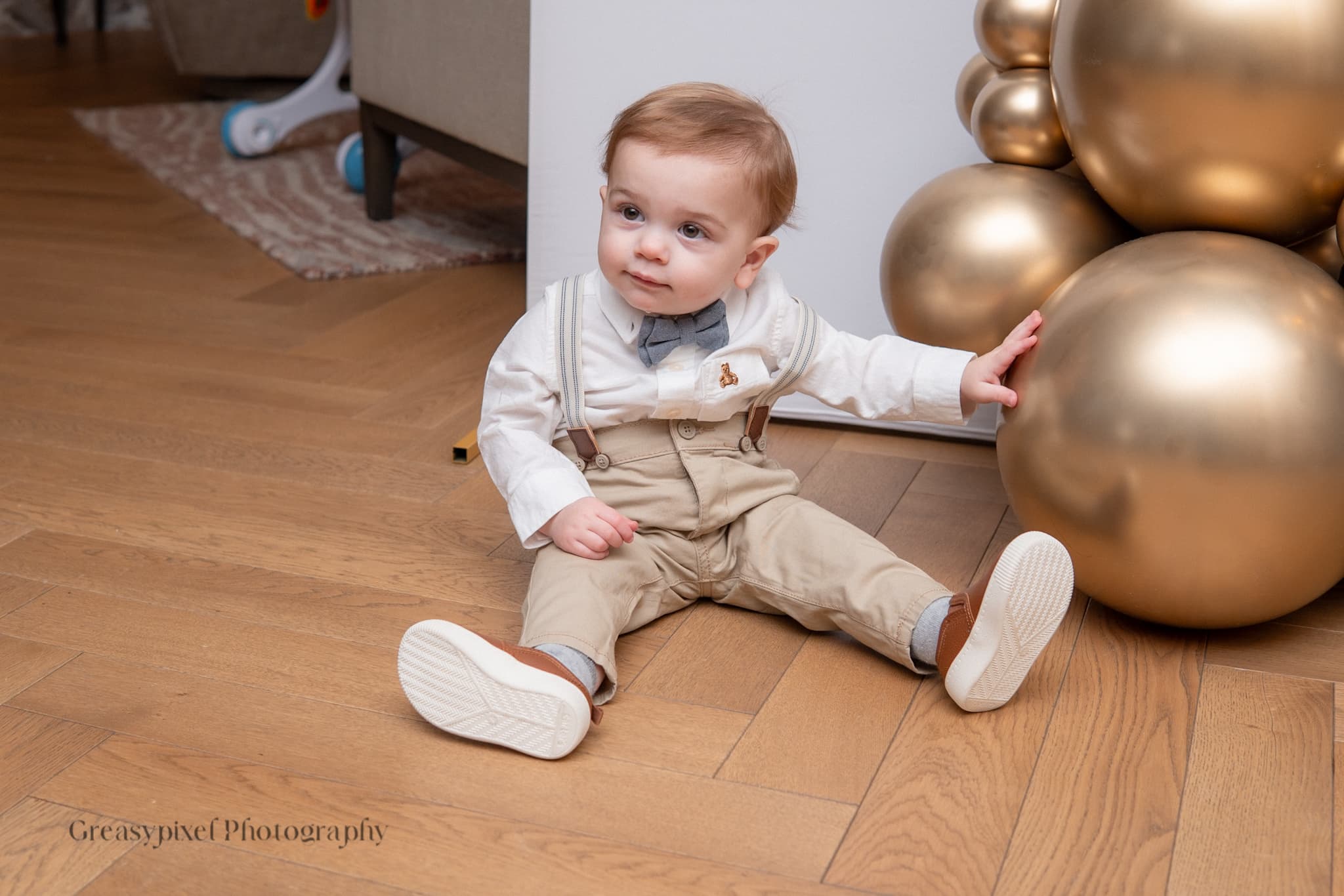 Event photography Kitchener Waterloo - baby crawling during celebration