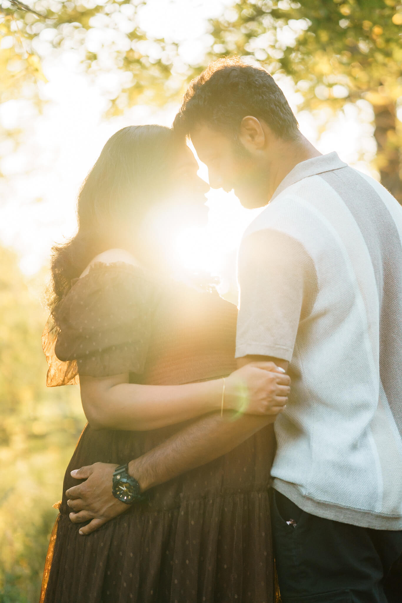 Expectant couple during golden hour maternity session