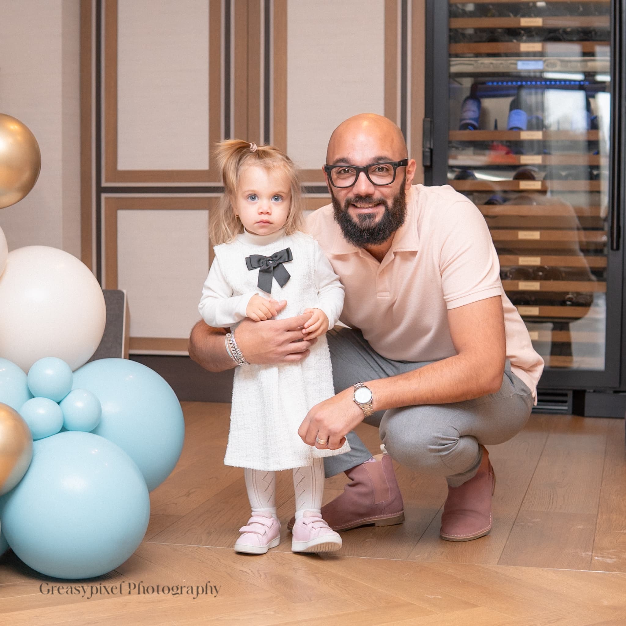 Event photography Kitchener Waterloo - mother with baby and balloon